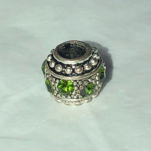 Green stone silver barrel bead.